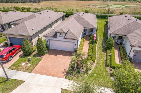 Photo of 19367 Coastal Shore Terrace, Land O Lakes, FL 34638 (MLS # TB8491769)