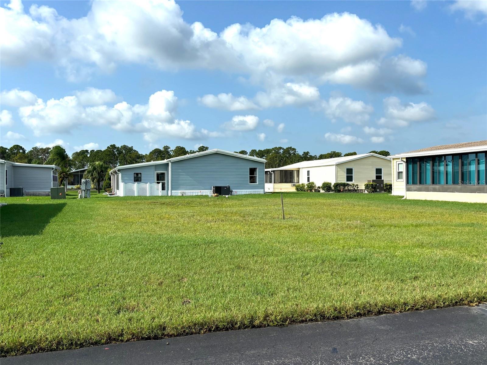 Vacant lot in a vibrant 55+ community! La Casa offers the ultimate Florida lifestyle. We have 974 homes nestled among a variety of native trees with spacious common grounds surrounding our eight lakes. Located between Sarasota and Fort Myers, this is a boater's dream with access to the Gulf of Mexico. It is convenient for shopping, sightseeing, golfing, fishing, and boating, as well as all the culture and elegance the Southwest Florida area is noted for. La Casa may have the best pools in the area. Our crown jewel is an extremely large, 40 X 60-foot swimming pool that is kept at a perfect 87 degrees. Our smaller 20 x 40 pool is quietly nestled between the clubhouse and the Activity Building. Both pools have adjacent hot tubs which are ideal for soaking muscles that are tired from golfing or tennis. Wireless Internet (Wi-Fi) is available at the Clubhouse, Activity Building, and Recreation Hall area where these pools & spas are located, so you can catch some rays while you catch up on your email! Sound enticing? Come for a visit to this self-contained oasis and see for yourself why La Casa is the ultimate destination for both snowbirds and year-round residents!