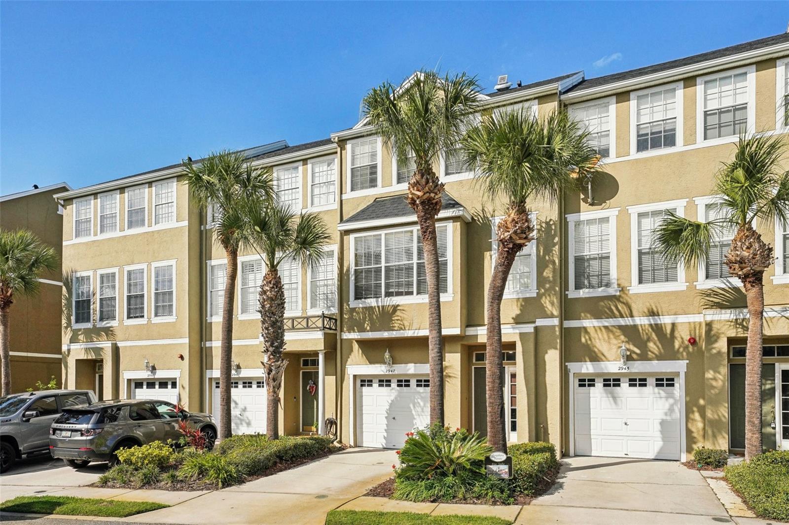 VA APPROVED COMMUNITY....Stunning Townhome in Exclusive Bayshore Pointe Community. Welcome to this beautifully updated 3-bedroom, 2.5-bathroom home located in the highly sought-after Bayshore Pointe community in Tampa, FL. This spacious and meticulously maintained residence offers a perfect blend of comfort, style, and modern conveniences. Upon entering, you'll be greeted by an open-concept living space with high ceilings, large windows, and abundant natural light. The chef-inspired kitchen features granite countertops, newer appliances, a large island, and custom cabinetry—ideal for both everyday living and entertaining. The formal dining area is perfect for hosting gatherings.The expansive master suite is a true retreat, featuring a large walk-in closet and a luxurious en-suite bathroom with a soaking tub, separate shower, and dual vanities. Two additional generously-sized bedrooms and a full bath provide ample space for family or guests. Step outside to the private screened-in lanai and enjoy the stunning views. The outdoor living area is perfect for relaxing or dining al fresco while taking in the tranquil surroundings. This home also offers access to community amenities, including a pool and tennis courts. With its ideal location just minutes from Bayshore Boulevard, downtown Tampa, and MacDill Air Force Base, this home offers the perfect blend of suburban tranquility and city convenience. Don’t miss the opportunity to own a piece of paradise in one of Tampa’s premier gated communities. Additional Features: Attached one-car garage, Newer roof and HVAC system, Community clubhouse and pool, Gated, secure neighborhood, Convenient to shopping, dining, and entertainment options. Schedule your private tour today! Home has an upstairs laundry room but another is already built out on first floor if desired.