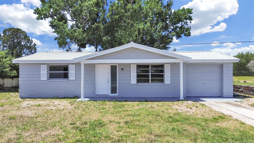 TEAR UP THE “HONEY-DO” LIST!! Welcome to your dream home in the heart of Orangewood Village community in Holiday, Florida. Everything here is fresh and worry-free! NEW – NEW - NEW! Experience total peace of mind with all major systems recently replaced: NEW Metal Roof (2025), NEW Water Heater (2025), and NEW HVAC (2025) with manufacturer's warranty until 2035. This updated, move-in-ready 3-bedroom, 1-bathroom, 1-car garage is in one of Pasco County's most conveniently located communities on a large corner lot. Step inside to a bright, open floor plan with a great room featuring a kitchen, dining area and family room. You will love the stunning kitchen with NEW Cabinets, (2025) NEW Granite Countertops (2025), and NEW Stainless Steel Appliances (2025). New Luxury vinyl plank (LVP- 2025) flooring throughout adds style and durability. Situated in a non-flood zone and with no HOA, no deed restrictions, and no rental restrictions, this property provides exceptional flexibility for full-time living or investment opportunities. Enjoy coastal proximity without being in a designated flood zone. Nearby Anclote River Park and Anclote Gulf Park offer boating and fishing, while Key Vista Nature Park provides trails and nature views. Fred Howard Park Beach and the Tarpon Springs Sponge Docks with waterfront dining and shops are a short drive away. Shopping, restaurants, and access to US-19 are also close by for commuting to Palm Harbor, Clearwater, and Tampa. Don’t miss the chance to own a beautifully updated home just minutes from the Gulf — schedule your tour today.