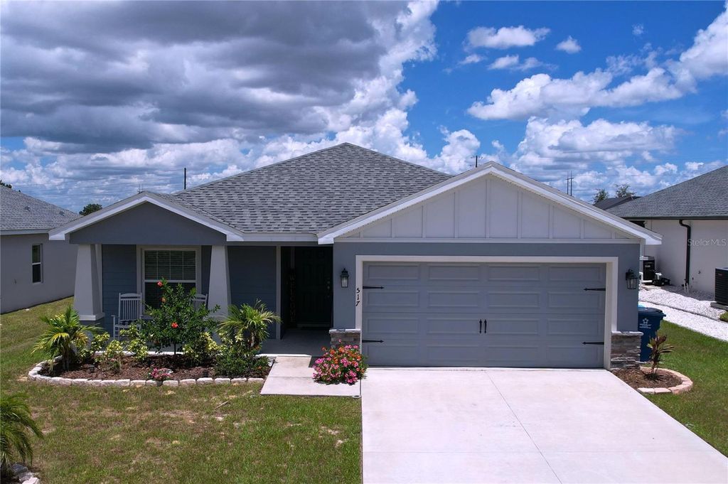 Photo of 517 Scenic Bluff Boulevard, Lake Wales, FL 33853 (MLS # O6326516)