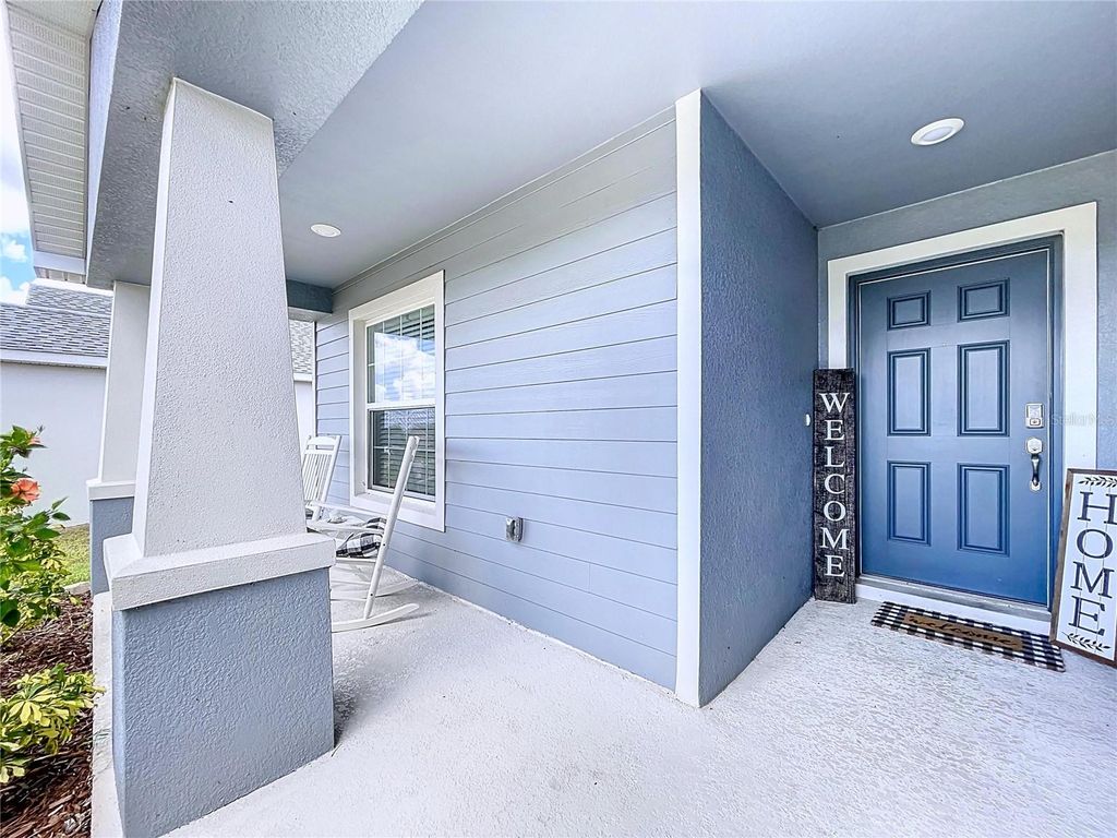 Photo of 517 Scenic Bluff Boulevard, Lake Wales, FL 33853 (MLS # O6326516)