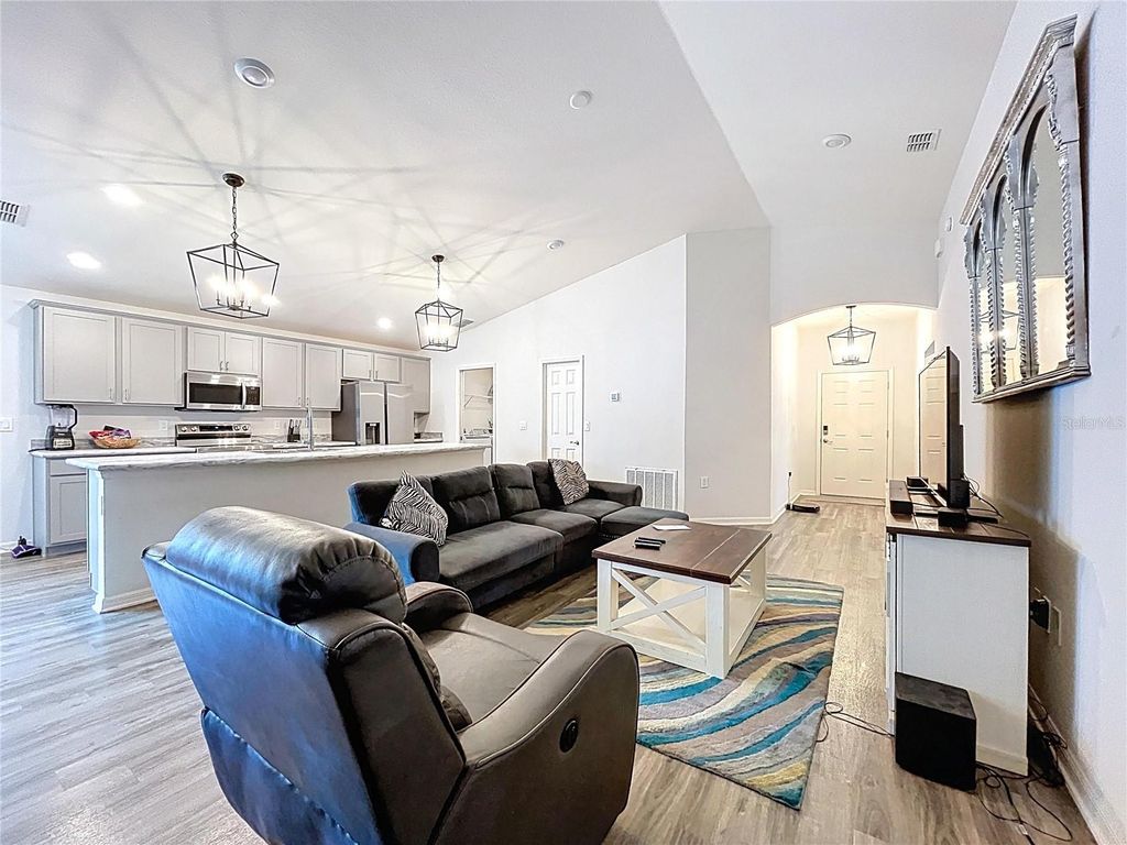 Photo of 517 Scenic Bluff Boulevard, Lake Wales, FL 33853 (MLS # O6326516)