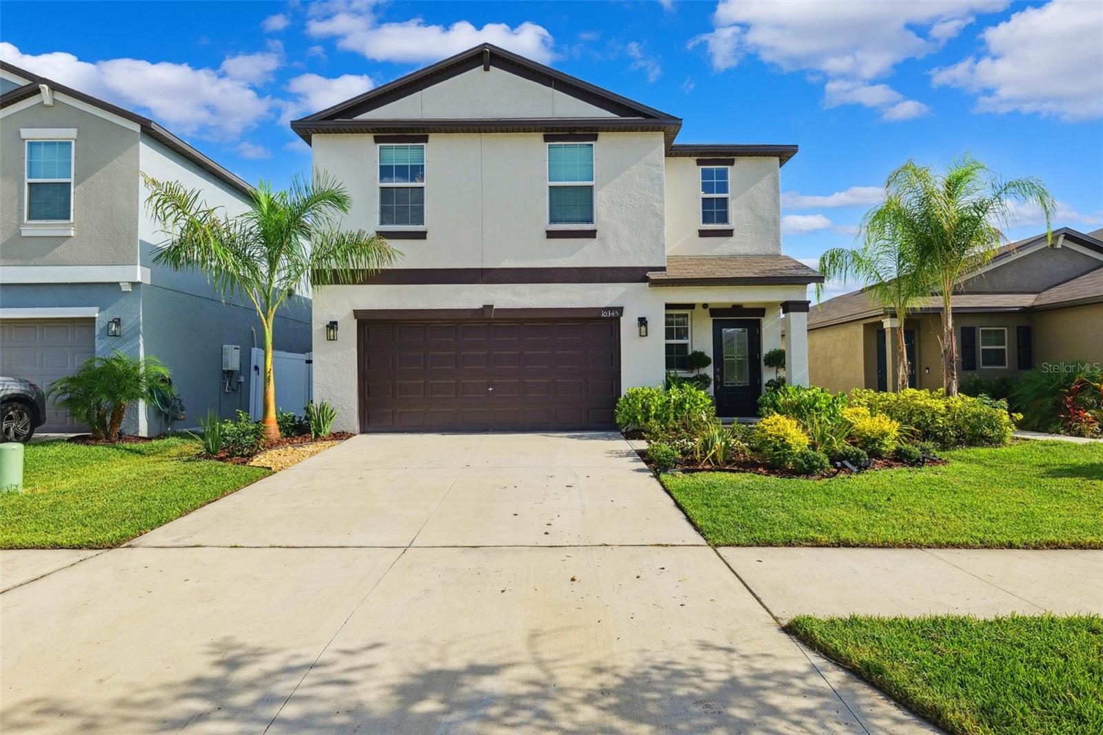 Only 2 years old, better than new! Upgraded landscaping with royal palm in the frontyard. Extended paver patio with tropical landscape, in the backyard. Brand new washer and dryer! Includes hurricane shutters, 2024 custom Westshore glass front door. Whole house freshly painted. New gas stove, granite counters and large pantry in the kitchen. 4 over sized bedrooms with addition living space upstairs. This home wont last long, come see it before its gone!