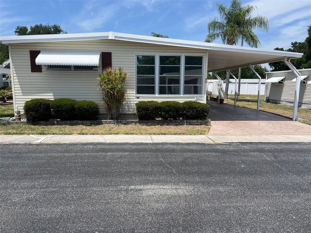 Photo of 96 Royal Palm Circle, Largo, FL 33778 (MLS # TB8504608)