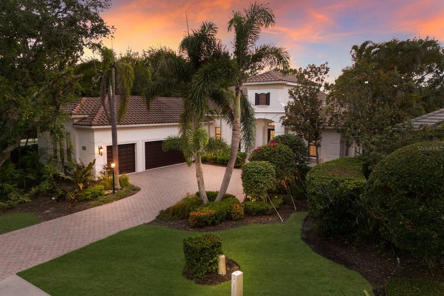 Savor one of the most breathtaking lake, golf, and preserve settings in Lakewood Ranch from this beautifully appointed Westover II model nestled in a serene, private setting on the King’s Dunes golf course in The Country Club. The light and bright 3,885 square foot residence custom built by Neal Signature Homes boasts westerly views showcasing perfectly proportioned spaces, exceptional design, newly painted interior and exterior, volume ceilings, engineered wood flooring, and stunning sunsets nightly. 

The recently installed new panoramic screened lanai cage further accentuates the outdoor living experience, along with the heated pebble tec pool/spa with sun shelf, two separate covered areas, gas fireplace and an outdoor Summer kitchen. The surrounding vistas bring the unmatched optic experience indoors seamlessly via sliding glass doors and a plethora of transom windows, with architectural details and designer touches throughout, including tray ceilings, crown moldings, and trimmings at every turn. 

An invitingly large great room open to the kitchen where form, function and design reigns cohesively with sprawling granite counters, wood cabinetry, high performance appliances, breakfast bar, a walk-in pantry, and a breakfast nook area adorned with the surrounding views beyond. Off the kitchen is a butler’s pantry with a wine fridge connecting to a lovely formal dining area and equally elegant living room infused with natural light.

Unwind in the owner’s retreat positioned on its own private wing on the main level, offering two walk-in customized closets and a luxuriously appointed spa-like bath with separate vanity stations, stand-alone shower, and a free-standing soaking tub. Family and overnight visitors alike will be right at home with the three additional guest rooms , two on the main level anchored by a full bath, while a third guest room is located upstairs off the home’s fourth full bath. On the upper level, there is also an expansive bonus room offering multiple flex living space options boasting some of the most incredible golf views in Lakewood Ranch.

Other notable highlights of this all-encompassing 5,351 square foot four bedroom four full bath maintenance free residence includes a perfectly located main level office/den at the rear of the residence with picturesque views just off the pool bath, a generously sized laundry room with sink and cabinetry, hurricane shutters, and an oversized 3-car garage. Within the #1 top-selling master-planned community known for its vibrant lifestyle, dining, shopping, A-rated schools and non-mandatory membership opportunities to become a member of Lakewood Ranch Golf & Country Club, which include four 18-hole championship golf courses, tennis, state-of-the-art Fitness center, clubhouses, junior Olympic-sized pool, pickleball and more.