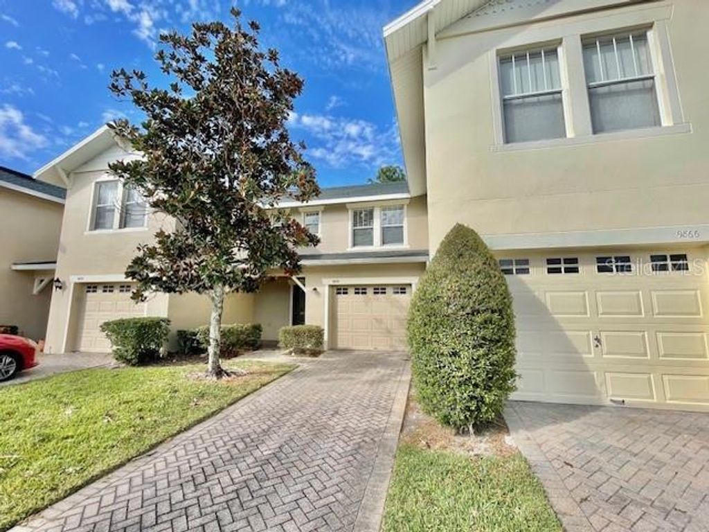 Photo of 9870 Tivoli Villa Drive, Orlando, FL 32829 (MLS # O6372025)