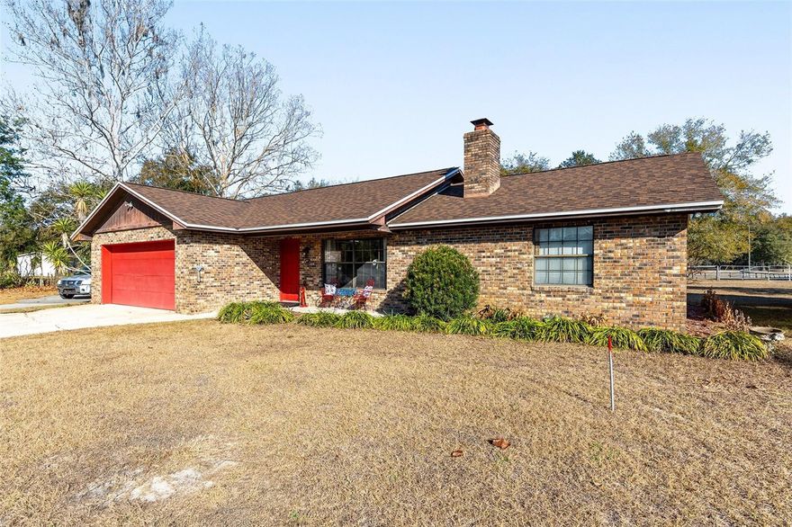 Experience the perfect combination of comfort, space, and rural charm with this well-maintained 3-bedroom, 2-bathroom brick home situated on 3.21 acres in the peaceful community of Citra. Ideal for those seeking a private homestead, hobby farm, or equestrian-friendly property, this residence offers both functionality and timeless appeal.
The home features a practical layout with bright, open living spaces and durable brick construction designed for low maintenance. Two well-appointed bathrooms provide convenience for family and guests, while the overall floor plan supports both everyday living and entertaining.
Outdoors, the acreage is thoughtfully arranged with open pasture accented by mature trees, creating a scenic and usable landscape. Horse enthusiasts will appreciate the two-stall barn, offering space for animals, equipment, or additional storage. With ample room to expand, garden, or simply enjoy the quiet surroundings, this property presents a wide range of possibilities.
Conveniently located between Ocala and Gainesville, this mini farm offers the tranquility of country living with easy access to The World Equestrian Center and other nearby amenities, services, and commuter routes.
New roof in Nov 2024
