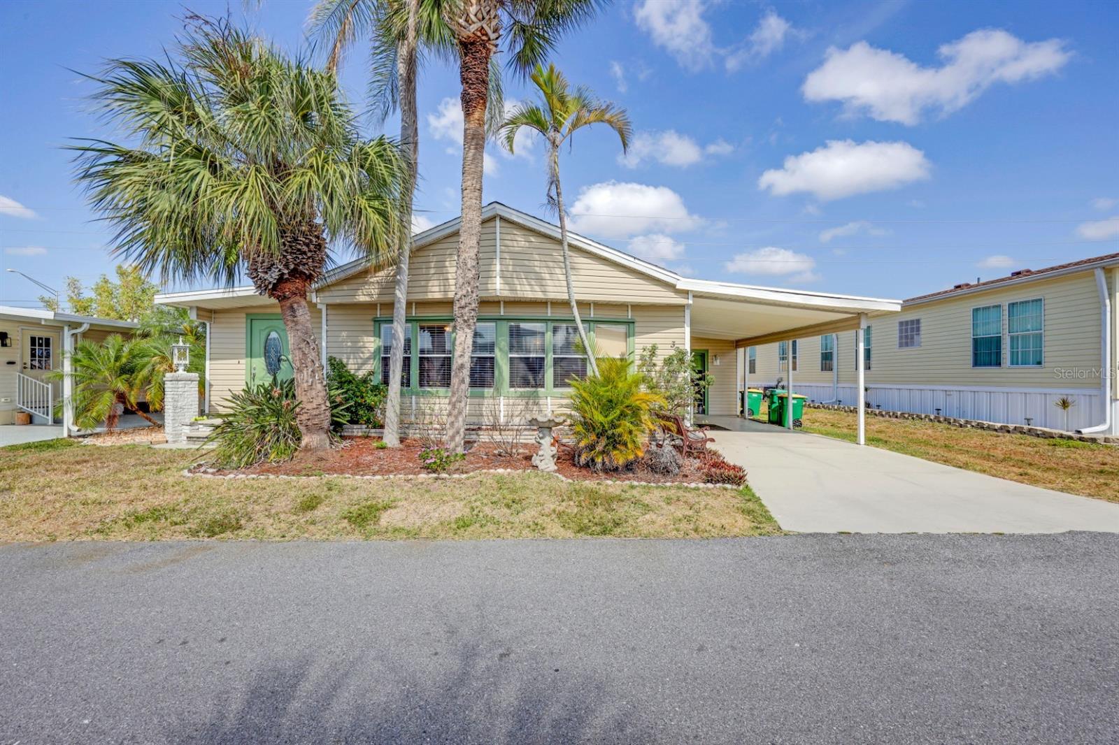 This charming 2-bedroom, 2-bathroom home is situated on a desirable perimeter lot, offering added privacy and backyard space. Inside, you'll find a bright and spacious layout featuring updated kitchen with wood cabinets, updated interior walls and a large sunroom that is perfect for relaxing or entertaining. The kitchen includes a convenient pass-through breakfast bar to the spacious living and dining area, creating a welcoming atmosphere. The primary bedroom includes an en-suite bathroom with a walk-in shower, while the second bathroom offers a shower/tub combination. On the exterior you will certainly enjoy the rear covered patio and of course the large 180sq foot shed with roll-up door, ideal for a workshop, golf cart parking, laundry, storage and more. Don't miss the opportunity to make this well-maintained home yours! **Be sure to check out the 3-D virtual tour and walk through video links** Located in award winning Maple Leaf Golf & Country Club, a popular 55+ gated golf course community with an active resort lifestyle. Features a Par 62, 18 hole golf course, 5 tennis courts, bocce ball, lawn bowling, 2 shuffleboard courts, 4 heated swimming pools, 2 hot tubs, fitness facility, woodworking facility, 75+ clubs/activities, 4 pickleball courts, restaurant with full service bar, tiki hut/bar and more. Don't miss out on this opportunity to live in a thriving community where every day feels like a vacation. It's true what they say, it's all about the lifestyle.