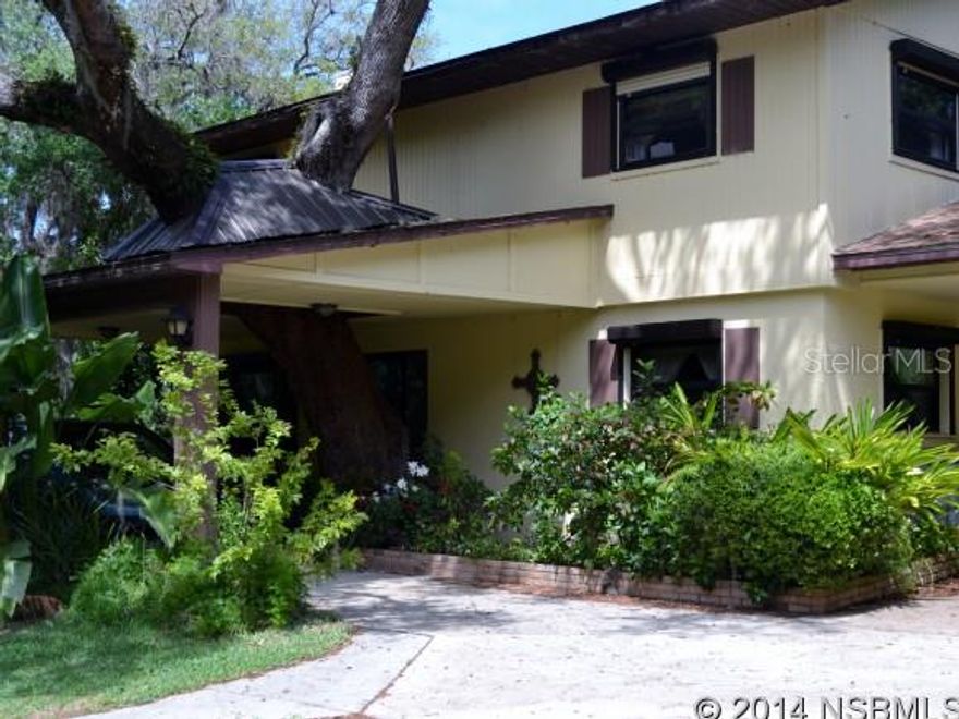 Old Florida Living at its best.  36+ acres with approx. 27 cleared with ponds and creek running through the property.  Driveway is approx. 1/2 mile long to the country style home with large loft master bedroom, sunroom, family room, study, large laundry room and screened porch in rear,  family room and kitchen. Large fenced in area for Dog playground. Guest house  currently used as work out room and storage.  Living room fireplace and family room wood burning stove.  Green house included  for those special orchids. Large Barn with interior 36x24 including roof covered area on each side of the bar gives overall covering 36x54 Property has three wells and a fire well near the house.  Ready for immediate occupancy.   The possibilities are endless with this property.  Parcel # 953702001003 is included in the acreage to total.