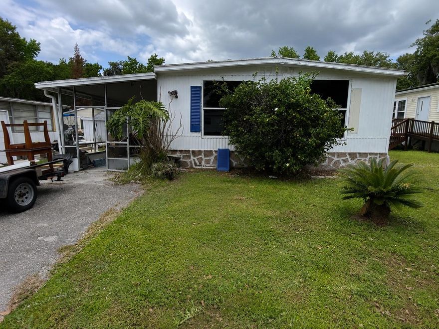 Investor special with strong upside potential! This 3-bedroom, 2-bath split floor plan home sits on OWNED LAND — no lot rent. Renovations have already been started, making it a great opportunity for investors, flippers, or buyers looking to customize.
Located in the gated waterfront community of Leisure World Park with an exceptionally low HOA. Community amenities include a pool, marina, private boat ramp, dock, shuffleboard, and basketball courts. Enjoy direct access to the St. Johns River and Lake Monroe, perfect for boating, fishing, and outdoor living.