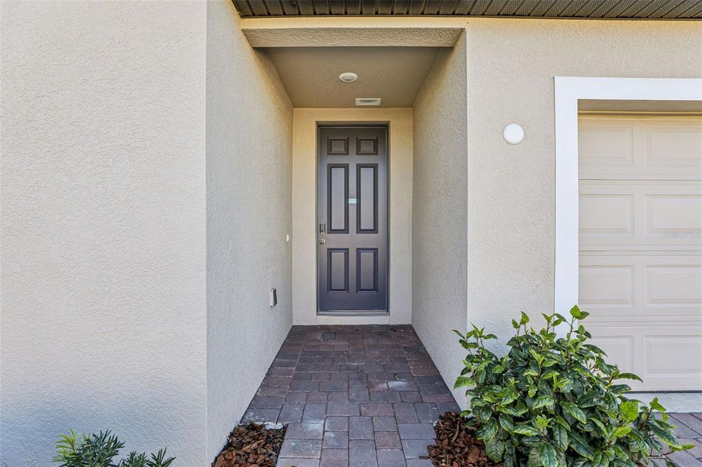 Photo of 882 Sand Sea Place, Haines City, FL 33844 (MLS # O6337117)