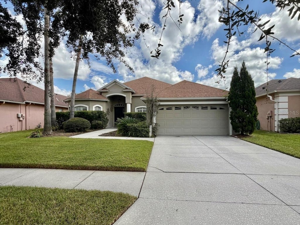 Photo of 2336 Shirecrest Cove Way, Lutz, FL 33558 (MLS # OM732585)