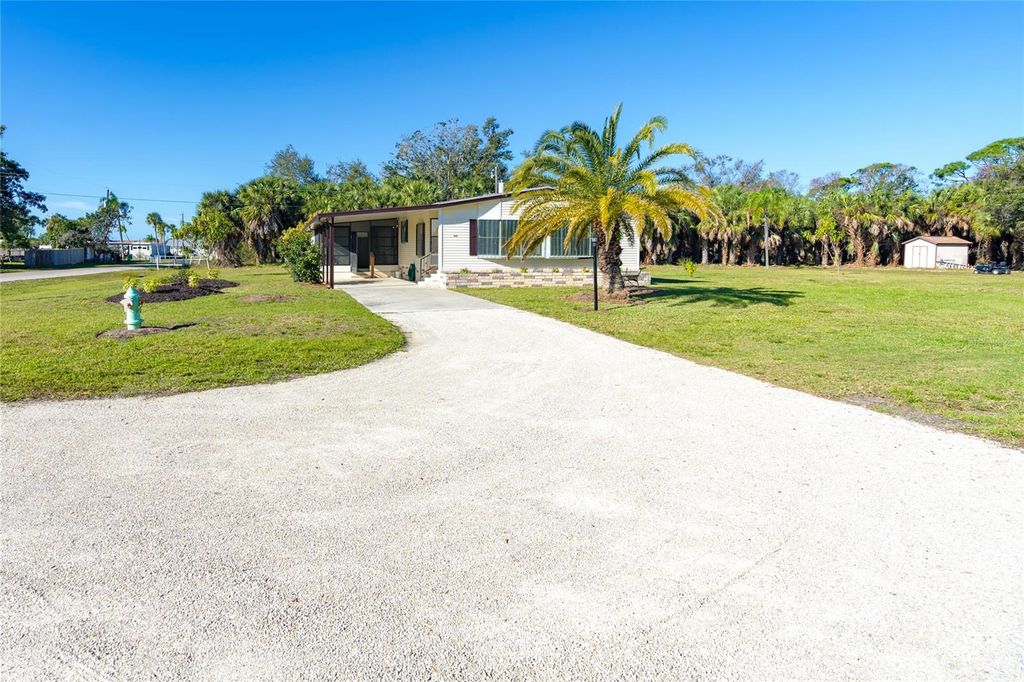 Photo of 3080 Waterside Drive, Englewood, FL 34224 (MLS # A4665750)
