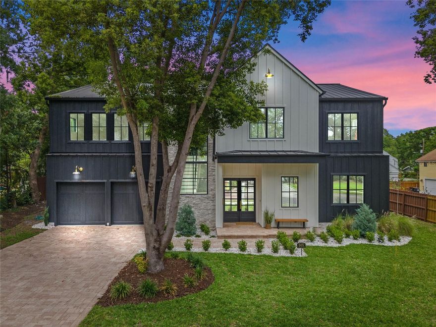 One or more photo(s) has been virtually staged. Welcome to the epitome of modern luxury nestled in the heart of downtown Orlando’s Delaney Park Community. This breathtaking new construction home is a seamless blend of sophistication and sustainability, designed to cater to the most discerning tastes. With 5 bedrooms, each boasting its own en suite, and a dedicated in-law suite on the first floor with a sitting area, this residence is a sanctuary of privacy and comfort.

Step inside to find luxurious high-end finishes throughout. The chef’s kitchen, a masterpiece of design and functionality, features dual islands that can seat 10, a 48" gas range with pot filler, knurled brushed gold handles, and elegant quartz waterfall countertops atop custom wood cabinetry. The adjacent butler's pantry, equipped with a second refrigerator, microwave, and prep sink, ensures entertaining is a breeze.

The home’s architectural brilliance is highlighted by soaring ceilings and an abundance of natural light, creating an inviting atmosphere that captivates at every turn. The stunning primary suite is your private retreat, complete with a spa-like bathroom featuring a steam shower, marble flooring, dual vanities, and a walk-in closet large enough to impress the Kardashians. It also includes a makeup vanity, a secondary closet, and a king-sized bedroom space.

Beyond its beauty, the home is designed with eco-friendliness at its core. The outdoor living space is both luxurious and energy-efficient, featuring a Mont Alpi black SS Natural Gas summer kitchen with side burner and pizza oven. R-38 ceiling insulation, LED lighting, Nest Thermostats, and LP® SmartSide siding contribute to its sustainability, while a metal roof with Solar Board insulation ensures resilience against any weather.

Located in a neighborhood that's a harmonious blend of urban charm and natural splendor, with five parks, scenic trails, and a vibrant community just a mile from Orlando’s cultural and gastronomic attractions, this home is more than a residence—it’s a lifestyle.

Invite luxury into your life and schedule a showing today to experience this unparalleled offering in one of Orlando’s most sought-after neighborhoods. Your dream home awaits. Bedroom Closet Type: Walk-in Closet (Primary Bedroom).