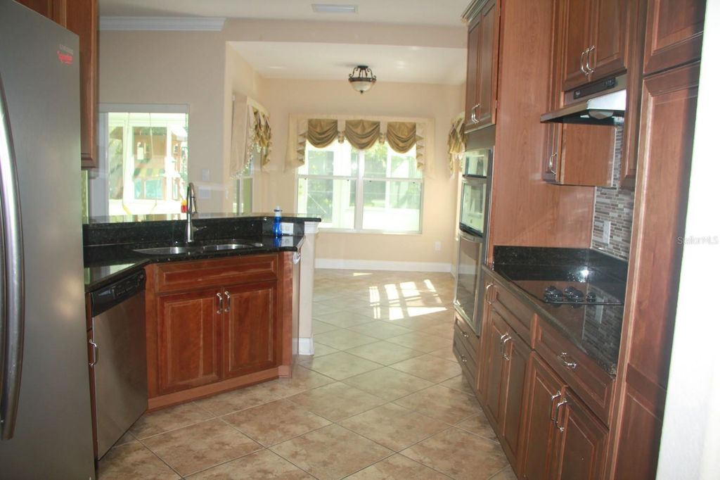Photo of 6935 Brescia Way, Orlando, FL 32819 (MLS # O6402824)