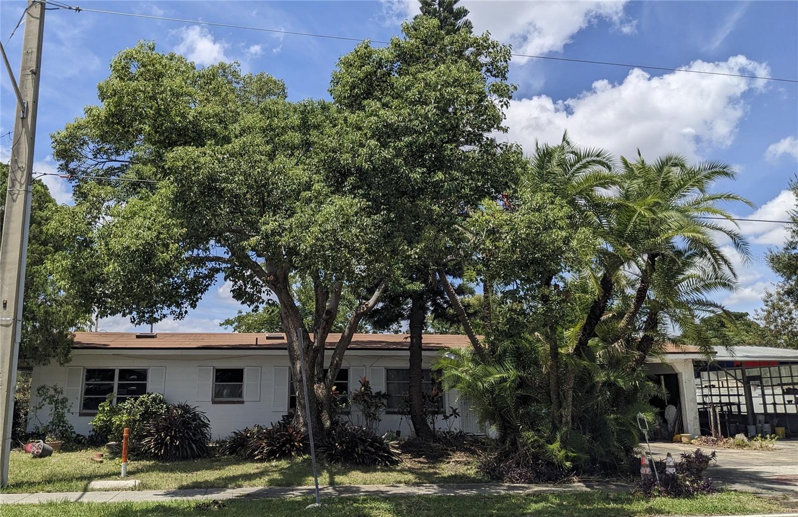 Attention Investors: Estate Sale! Four-bedroom two-bath home on over 1/3 of an acre! Four-car carport. Corner lot with two driveways.
Claw tub in the master bath & a walk-in tub in the guest bath.
Large kitchen.
Convenient location. Garden shed.