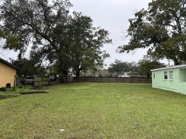 Vacant lot with proposed plans for a new tri-plex to be built, Very few lots available for new multi family construction. Go to site to view and or call for details.