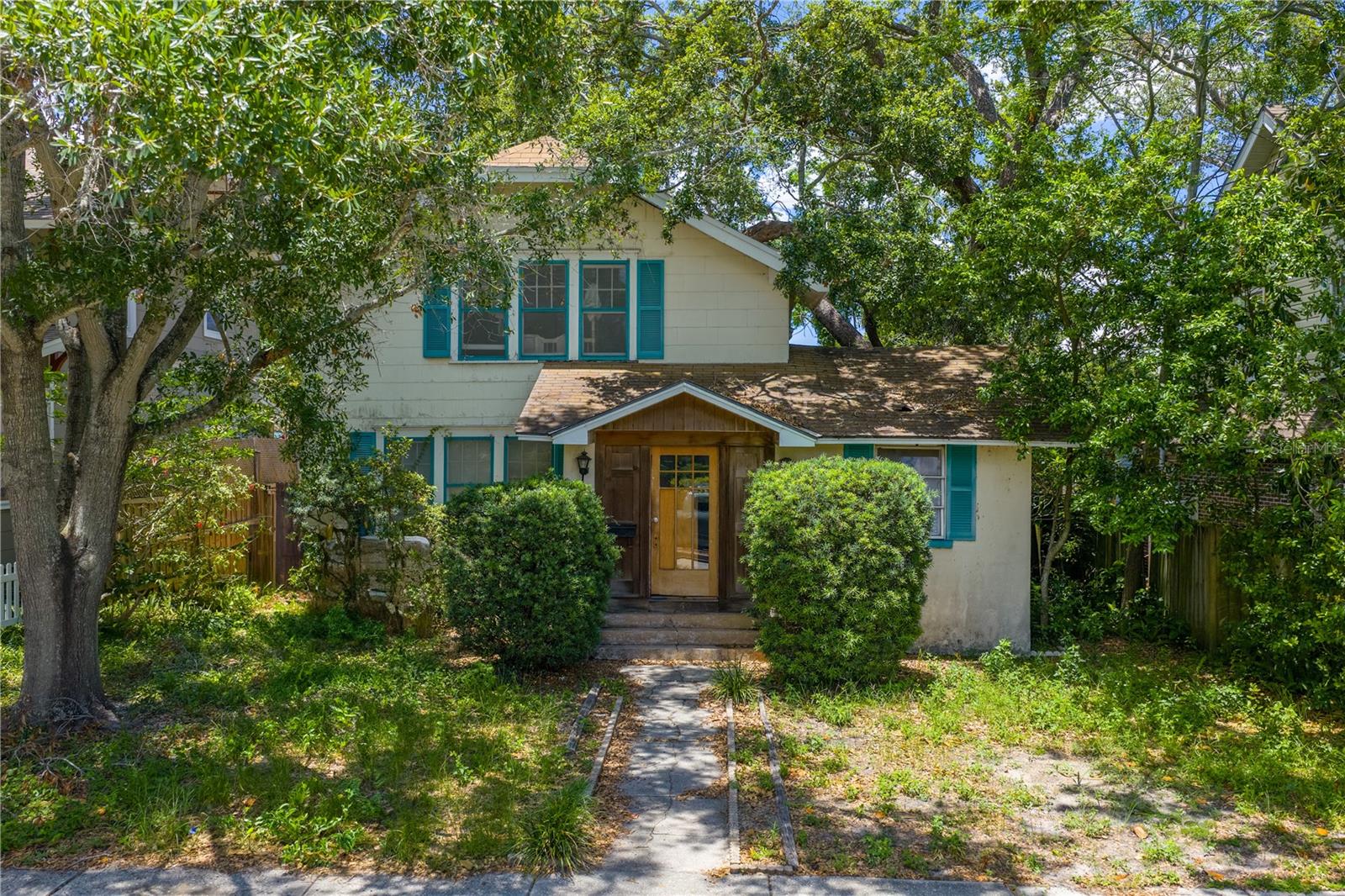 Welcome to the highly sought-after Crescent Lake neighborhood, where historic charm meets modern convenience. This high and dry 50'x109' lot is located in a desirable non-evacuation zone, offering peace of mind and a prime opportunity to create your custom dream home with the builder of your choice. Nestled on a quiet, tree-lined street with sidewalks and alley access, the property is framed by mature trees that offer beauty and shade, while the rear alley provides flexibility for garage placement or the addition of an Accessory Dwelling Unit (ADU) thanks to favorable zoning. Enjoy the best of both worlds: a peaceful residential setting within walking distance to Crescent Lake Park, and just minutes to vibrant downtown St. Pete, its award winning restaurants, cultural attractions, and the Gulf beaches. This is a competitively priced opportunity to invest in one of the city’s most beloved historic neighborhoods. Whether you're dreaming of a classic bungalow or a modern retreat, this lot is ready for you to bring your vision to life. Don’t miss your chance to create something truly special in a location that blends charm, convenience, and community.