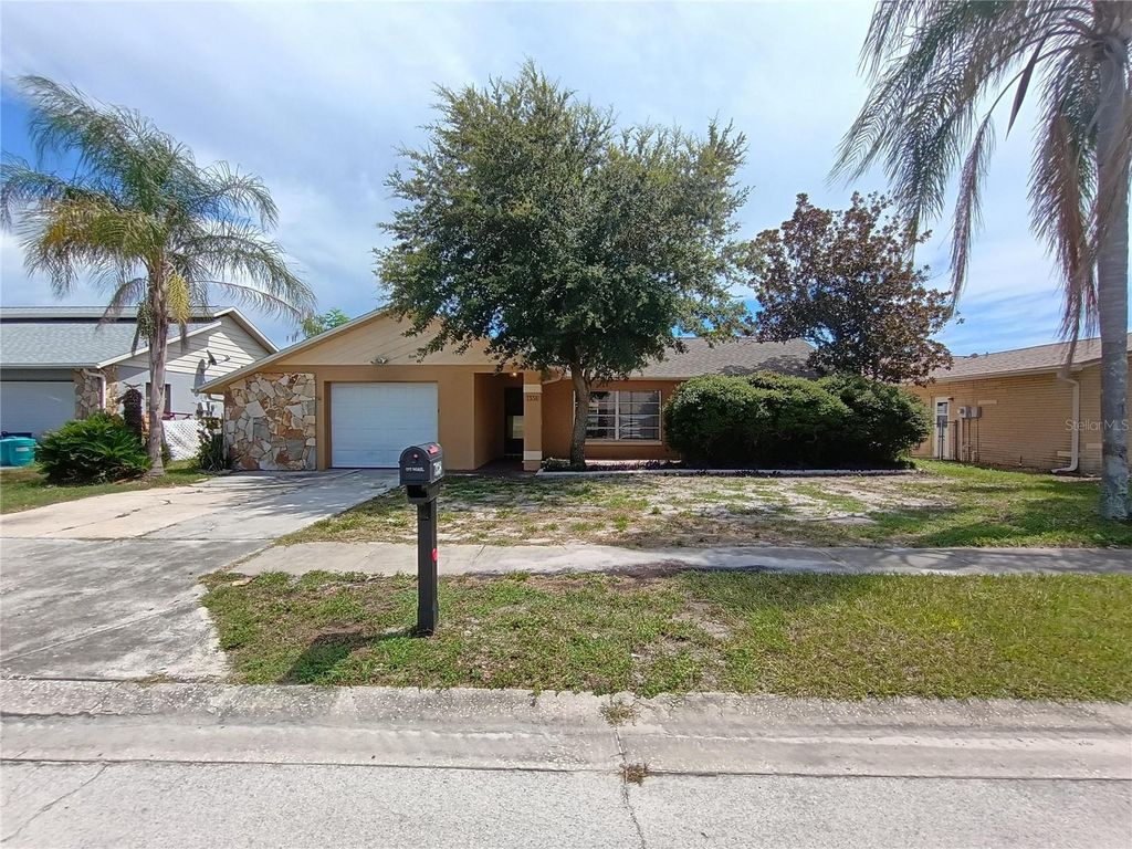 Photo of 7338 Foxbloom Drive, Port Richey, FL 34668 (MLS # TB8454364)