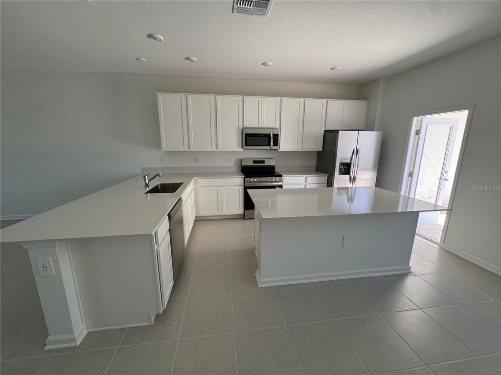 Photo of 5844 Meditation Drive, Clermont, FL 34714 (MLS # O6351737)