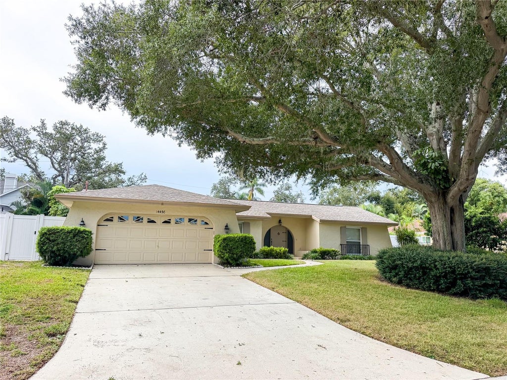 Photo of 14436 Bay Hills Drive, Largo, FL 33774 (MLS # TB8553854)