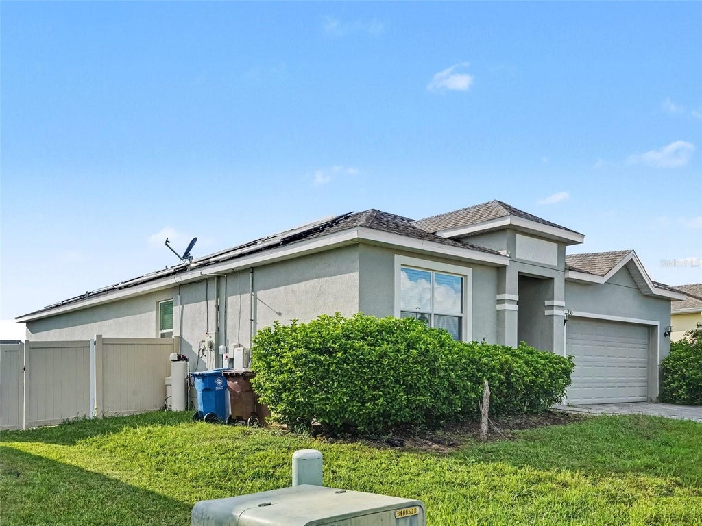 Photo of 230 Tarpon Bay Boulevard, Haines City, FL 33844 (MLS # TB8552750)