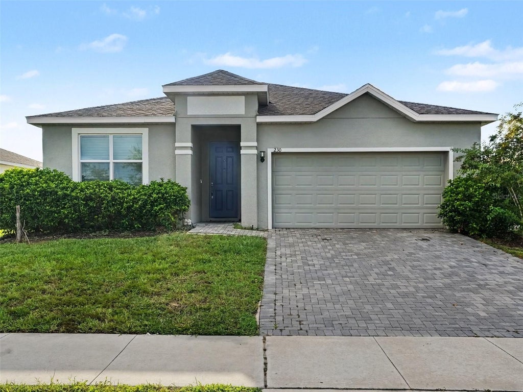 Photo of 230 Tarpon Bay Boulevard, Haines City, FL 33844 (MLS # TB8552750)