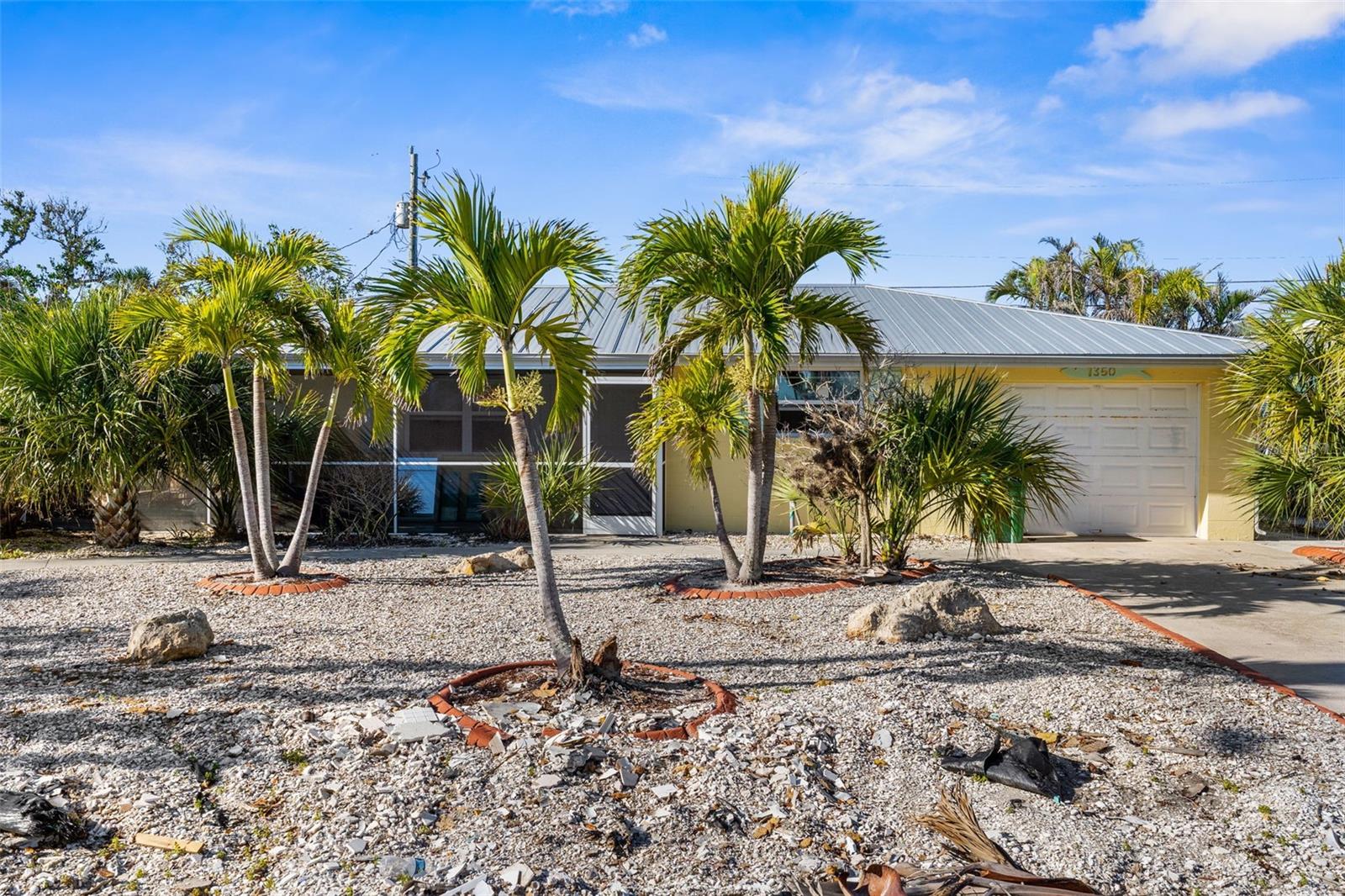 Opportunity awaits for you to create a beautiful single family home, multi-generational home or own the entire duplex and live in one side and rent the other! *Water damaged from hurricane* This prime location includes two deeded beach accesses and public access to the Gulf. Inside this structure is now a very open floor plan and a blank slate for you to renovate or remodel. **One side of the duplex is 1140 sq. ft. with a screened in front porch, 2 bed/2 bath with large walk-in closets, large living room with dining space, a kitchen and a private laundry room. The attached garage includes two storage closets. **The unit in the back is 1,025 sq. ft. with 2 bed/1 oversized bathroom, a large living room, a kitchen with dining space, and a laundry room. The private backyard is a brick paver patio and Tropical landscape that requires minimal maintenance. With a little work, this can become an amazing home or investment opportunity with Airbnb or VRBO and located at Englewood Beach on Manasota Key. Just a short walk to the beach and Stump Pass Beach State Park where you can enjoy canoeing/kayaking, fishing, beautiful nature trails, and world class shelling. Manasota Key is a tropical barrier island nestled between Sarasota and Fort Myers on the Gulf. Airports nearby include Tampa International (TPA-99 mi), Sarasota International (SRQ-47 mi), Punta Gorda (PGD-31 mi) and Fort Myers (RSW-70 mi). Manasota Key beach community will provide you with the sought after casual coastal lifestyle.