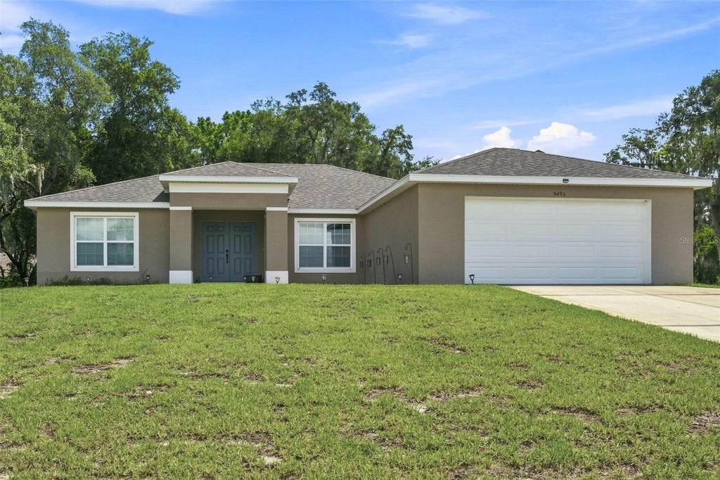 Photo of 9495 E Baymeadows Drive, Inverness, FL 34450 (MLS # OM729954)