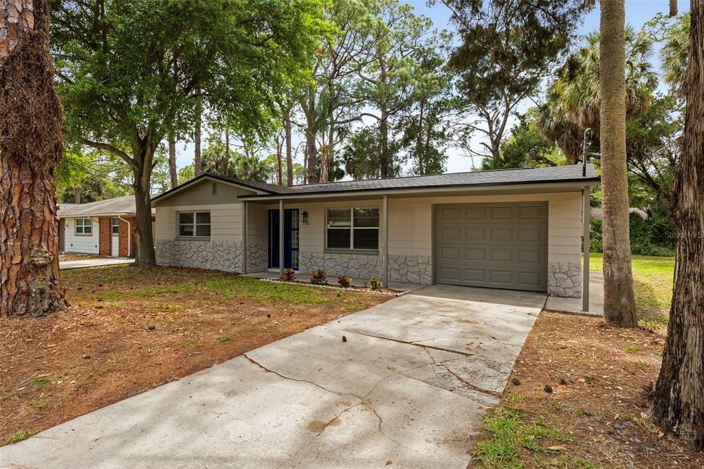 Photo of 7151 Pinewood Drive, New Port Richey, FL 34652 (MLS # TB8499052)