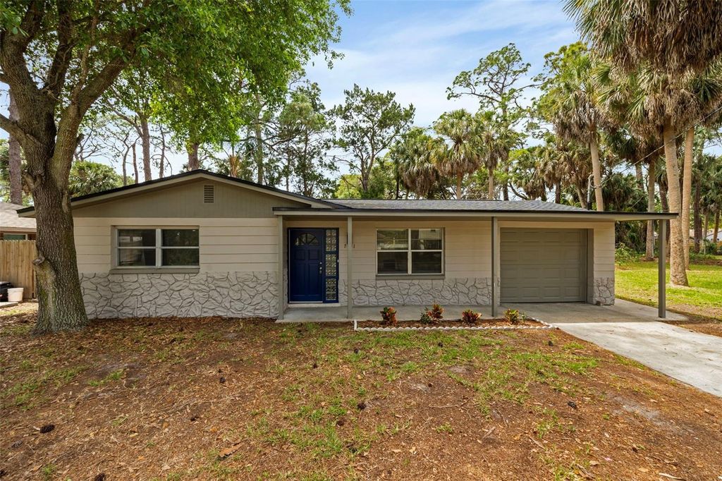 Photo of 7151 Pinewood Drive, New Port Richey, FL 34652 (MLS # TB8499052)
