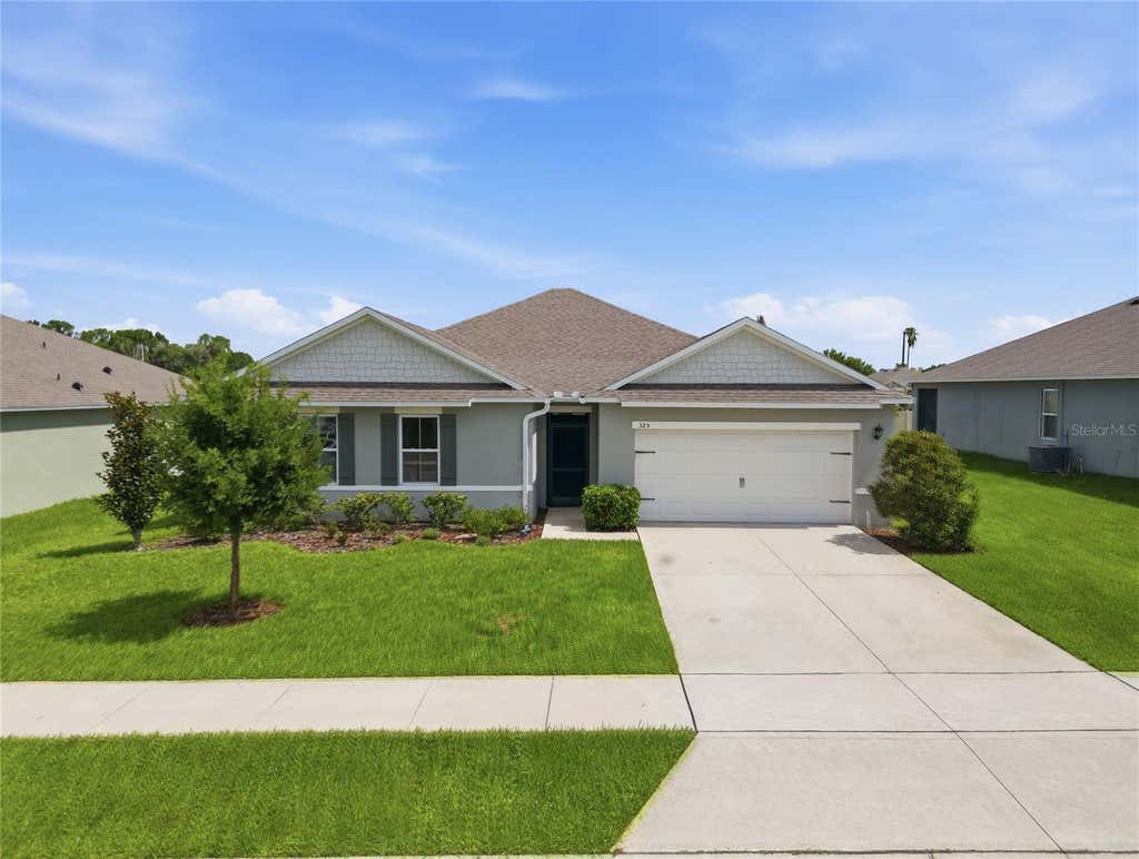Photo of 325 Auburn Grove Crossing, Auburndale, FL 33823 (MLS # L4963357)