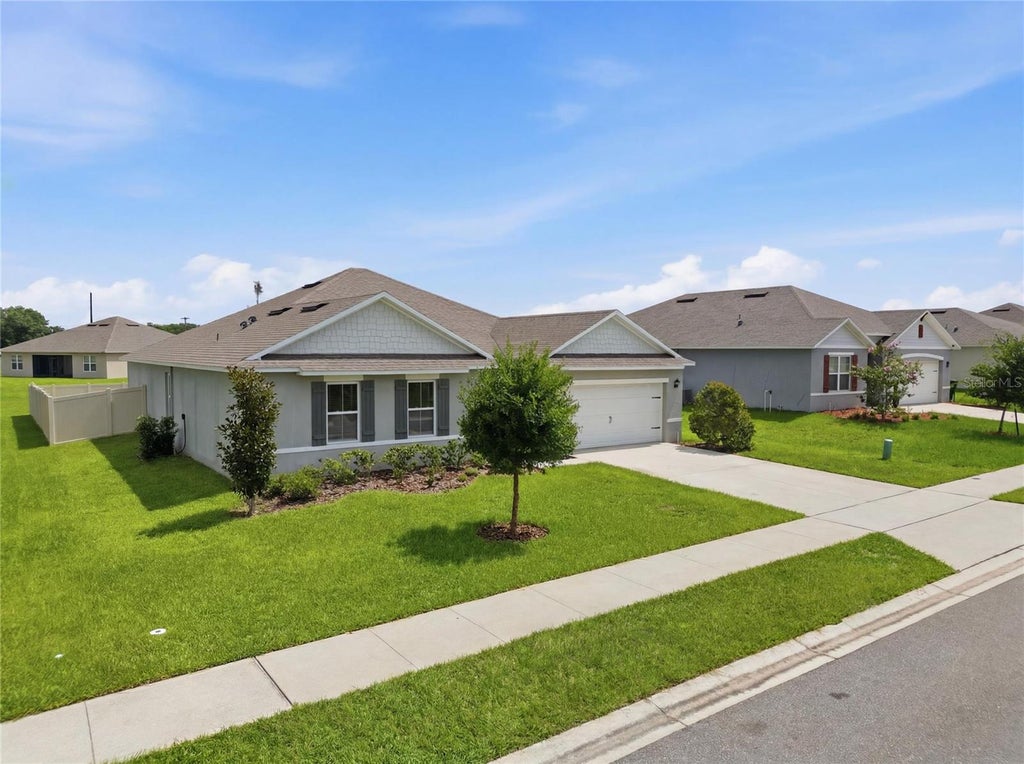 Photo of 325 Auburn Grove Crossing, Auburndale, FL 33823 (MLS # L4963357)