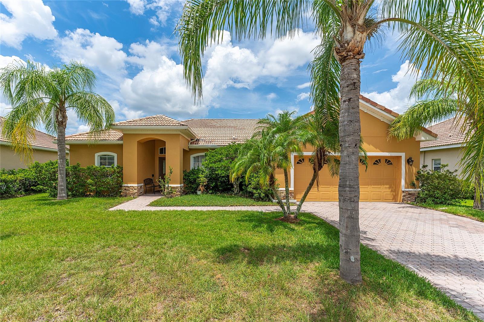 Welcome home. Beautiful lakefront 3-bedroom, 2-bathroom single-family home located in the highly desirable gated community of Bella Lago. Nestled along Lake Tohopekaliga, this home offers direct backyard lake views and tranquil waterfront ambiance only steps from your patio.
Inside, the home features a bright, open layout with a natural flow from the living area to the dining room and kitchen. A split-bedroom layout adds privacy, with the expansive primary suite on one side and two comfortable bedrooms on the other perfect for guests, family, or a home office.
Bella Lago provides resort-style living with two modern clubhouses, fitness centers, pools for all ages, splash zones, spa areas, tennis and basketball courts, and a scenic nature trail and bike path. The 1,300-foot lakeside boardwalk features a gazebo, fishing pier, boat dock and lift. On-site Village Shops provide convenient access to retail, restaurants, and Publix with pharmacy. Nearby schools include Bellalago Academy (K–8) and Liberty High School with its modern campus.
Perfectly located just 25–35 minutes by car from Walt Disney World, Universal Studios, and SeaWorld, you also have easy access to shopping, dining, downtown Kissimmee attractions, beaches, and major highways. This location offers lakeside peace with all the excitement of Central Florida at your doorstep. SELLER MOTIVATED!!!