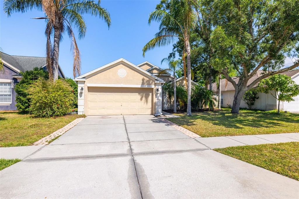 Photo of 29013 Old Marsh End, Wesley Chapel, FL 33543 (MLS # TB8365739)