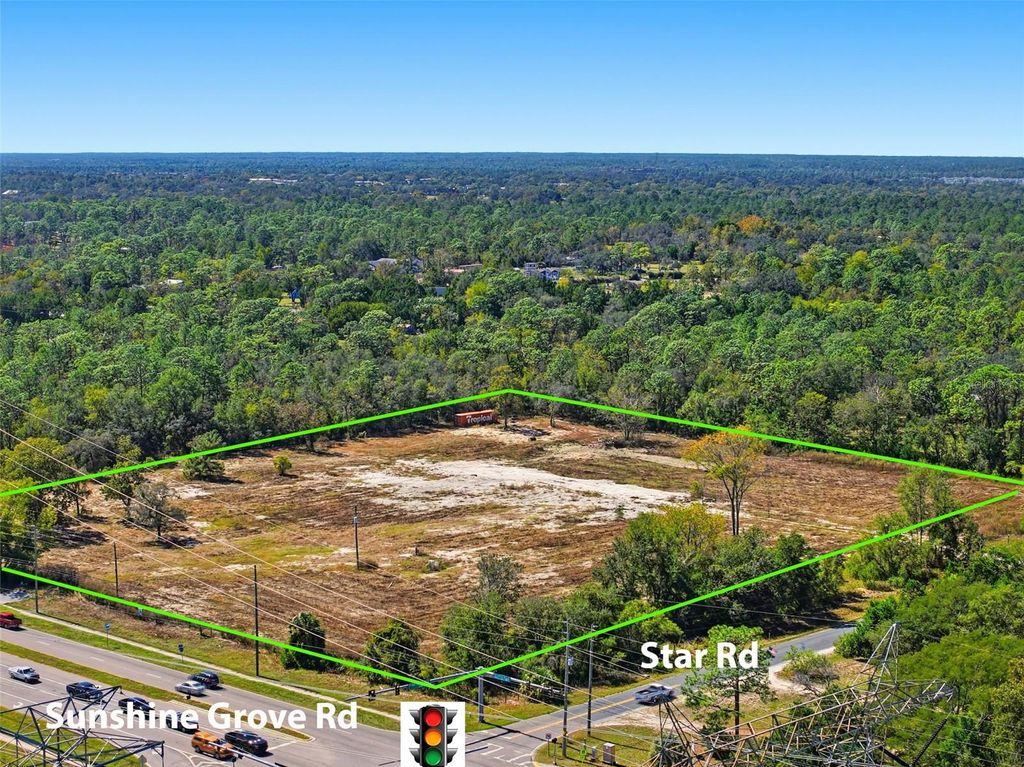 Photo of 9247 Sunshine Grove Road, Brooksville, FL 34613 (MLS # W7880194)
