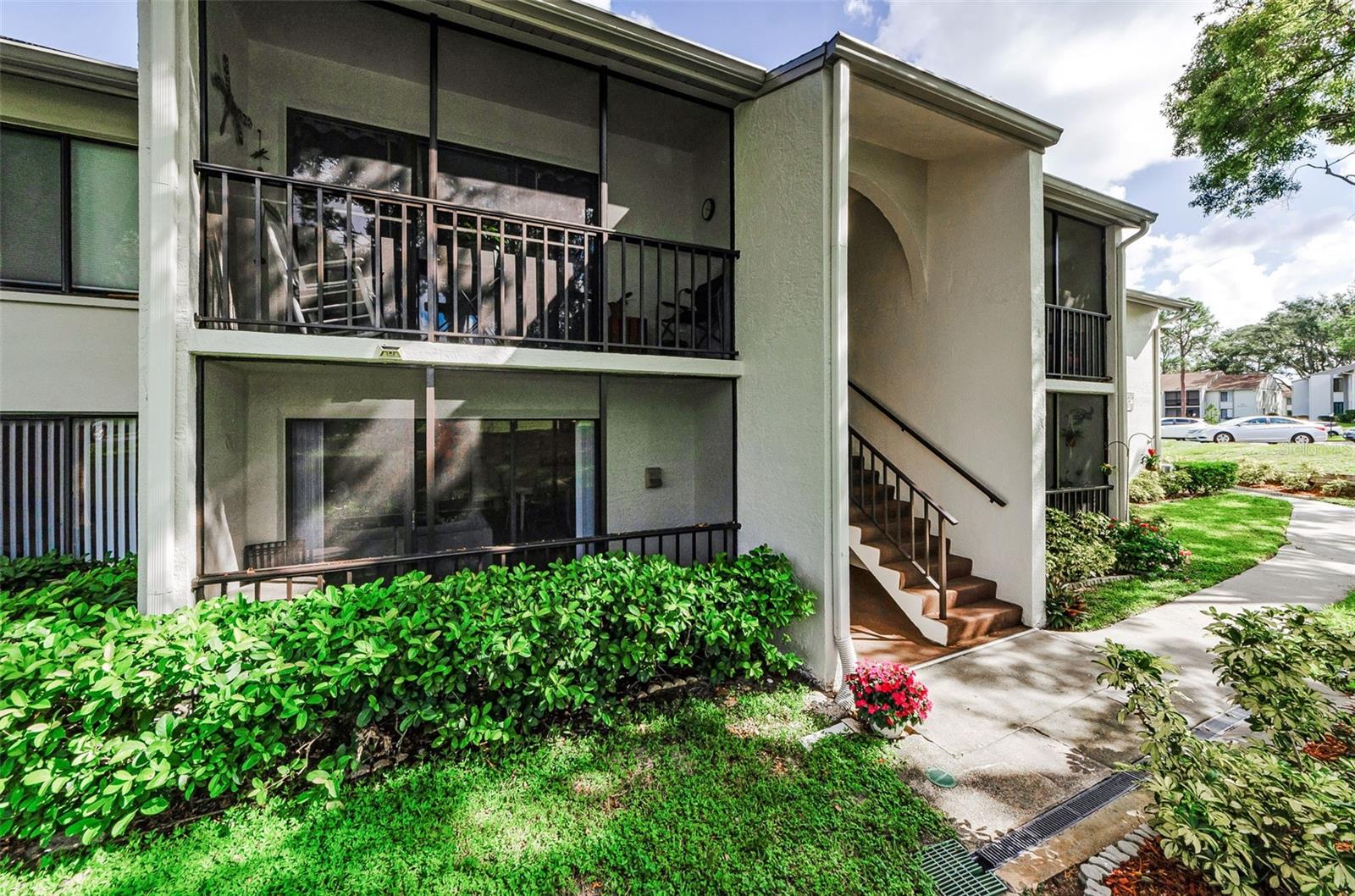 Great location in this 2 Bed 2 Bath First floor Home. Updated Kitchen with large pantry along with Eat-in area. Kitchen opens to Living room and Dining room. Relax on the covered and screened Lanai with ceramic tile. Separate Laundry room with storage and shelves. Newer vertical blinds throughout. Master Bedroom with Walk-in Closet. Master Bath with Walk-in shower. Convenient assigned parking space and plenty of visitor spaces. Clubhouse has a library, Sparkling Pool & Shuffleboard. Newer roof and all buildings were recently painted. Low Condo fees. Walking trail around the gorgeous pond with fountain. Close to gulf beaches, golf courses, walk & bike trail, shopping, restaurants & more! Furniture Available. PRESENT ALL OFFERS!