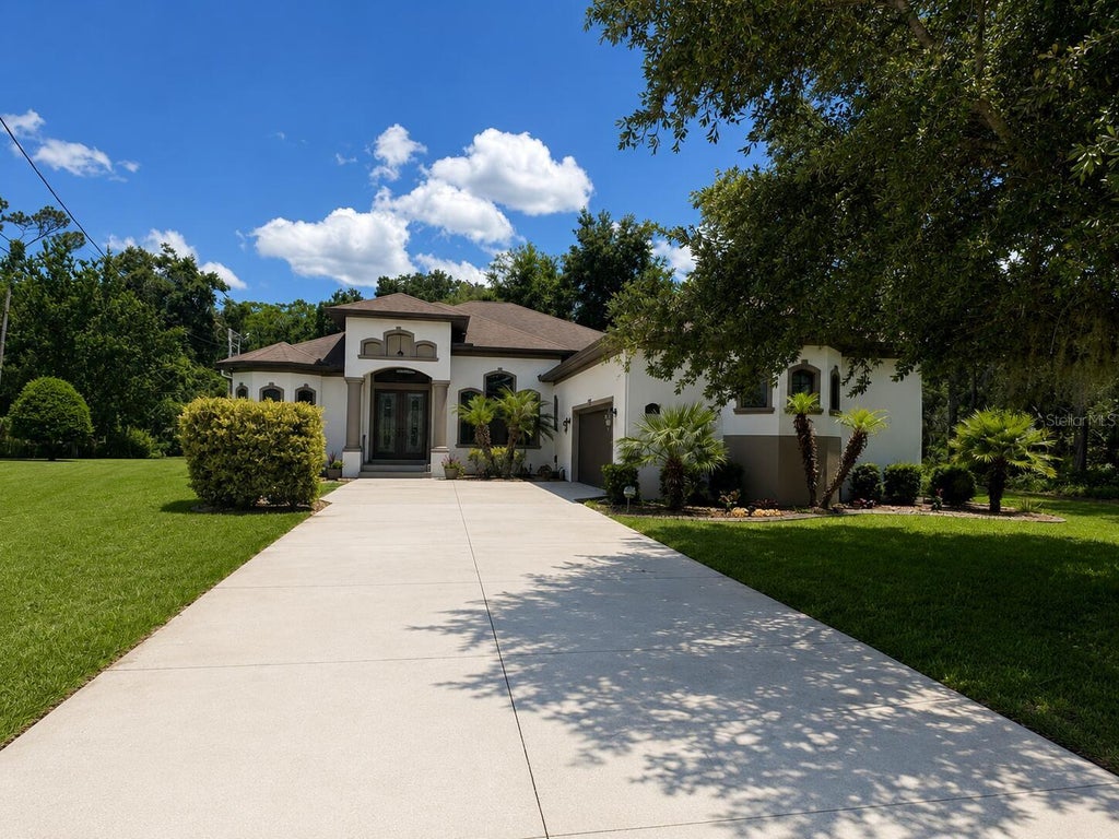 Photo of 30 Egret Trail, Palm Coast, FL 32164 (MLS # O6433991)