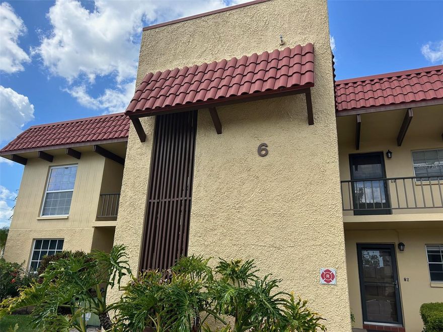 Rarely available 1-bedroom, 1-bathroom unit in an exceptionally well-maintained 55+ community overlooking a heated saltwater pool. Natural light fills the condo from front to back, creating a bright and inviting atmosphere. The galley-style kitchen offers ample cabinet space and a pantry for extra storage. The spacious living and dining area provides a peaceful space to relax, while the large bedroom easily accommodates a king-sized bed.The Florida room serves as an additional entertainment space, making the unit feel open and airy. Monthly maintenance of $375.52 includes: Spectrum TV Select with 1 cable box and 1 DVR, Spectrum internet modem and router, lawn care, exterior maintenance, water, sewer, and trash. Pennwood Manor is a 55+ community just 10 minutes from the beach, with shopping, parks, and restaurants only 5–10 minutes away. Residents enjoy a private park with walking paths, benches, picnic tables with umbrellas, a designated BBQ area with charcoal grills, a car wash, and bicycle storage.Needs TLC – bring your personal touch to make it your own!