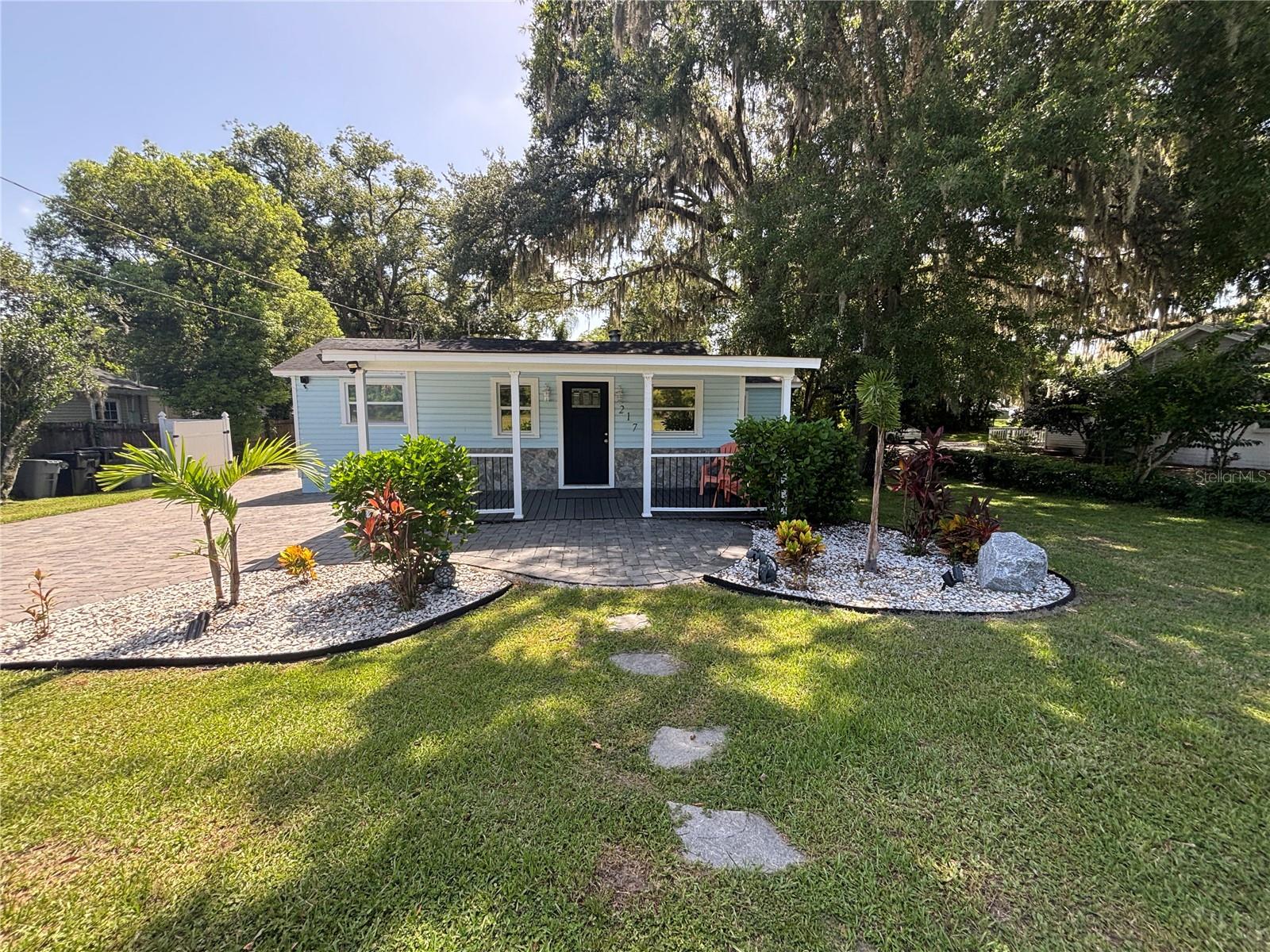Commercial lease opportunity in Downtown Apopka, FL. Fully renovated building with 1,337 sqft - 4 offices / 3 bathrooms, breakroom, reception area and an open flex space that can be utilized for numerous uses. Layout offers flexibility for private offices, meeting areas or workstations. Detached 1,200 sqft workshop with 14ft roll up door, ideal for warehouse storage, shipping or light operational use. Workshop also offers a private office with electrical in place. Ample secured parking with 7 spaces behind vinyl gated fence. Welcoming brick paver driveway in the front of the property providing 3 additional parking spaces. Zoned mixed use downtown district MU-D, county recognizes highest and best use as office, store front, industrial, medical and many more. The property contains safety and accessibility features following code requirements along with exterior security cameras. Great opportunity for businesses seeking a conveniently located property that offers both office functionality and onsite warehousing.