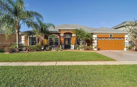 Photo of 18081 Thornhill Grand Circle, Orlando, FL 32820 (MLS # O6404146)