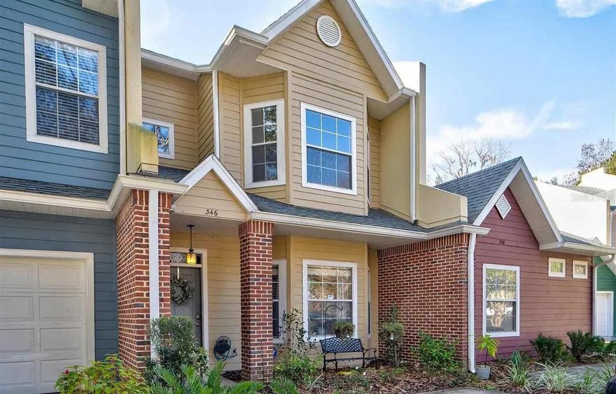 Welcome to a beautifully maintained 2-bedroom, 2-bathroom townhome with a spacious loft, perfectly located just minutes from the University of Florida, UF Health/Shands, and Butler Plaza. Step inside to find a bright, open floor plan with vaulted ceilings and natural light. The living and dining areas flow seamlessly, creating an inviting space for both relaxing and entertaining. The updated kitchen features ample cabinet space and a breakfast bar overlooking the main living area. The primary suite is conveniently located on the first floor with a fully renovated bath and generous closet space. Upstairs, you’ll find a second bedroom, a full bathroom, and a versatile loft that can serve as an office, guest room, or play area. Enjoy your morning coffee in the wooded backyard with a beautiful, lush greenery view. This quiet community offers a pool, tennis court, and well-maintained landscaping, providing a low-maintenance lifestyle with great amenities. Washer & dryer included.  Easy access to I-75, UF campus, Santa Fe College, and Gainesville’s best dining, shopping, and parks. GFH is just across the street from this neighborhood.