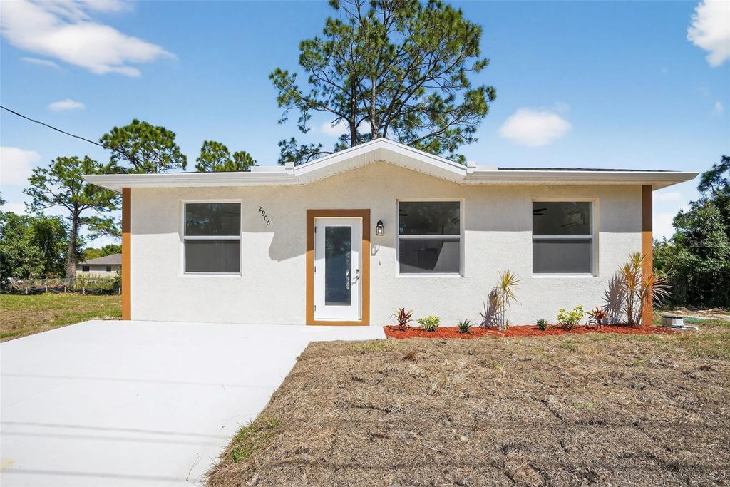 Photo of 2906 52nd Street W, Lehigh Acres, FL 33971 (MLS # O6393135)