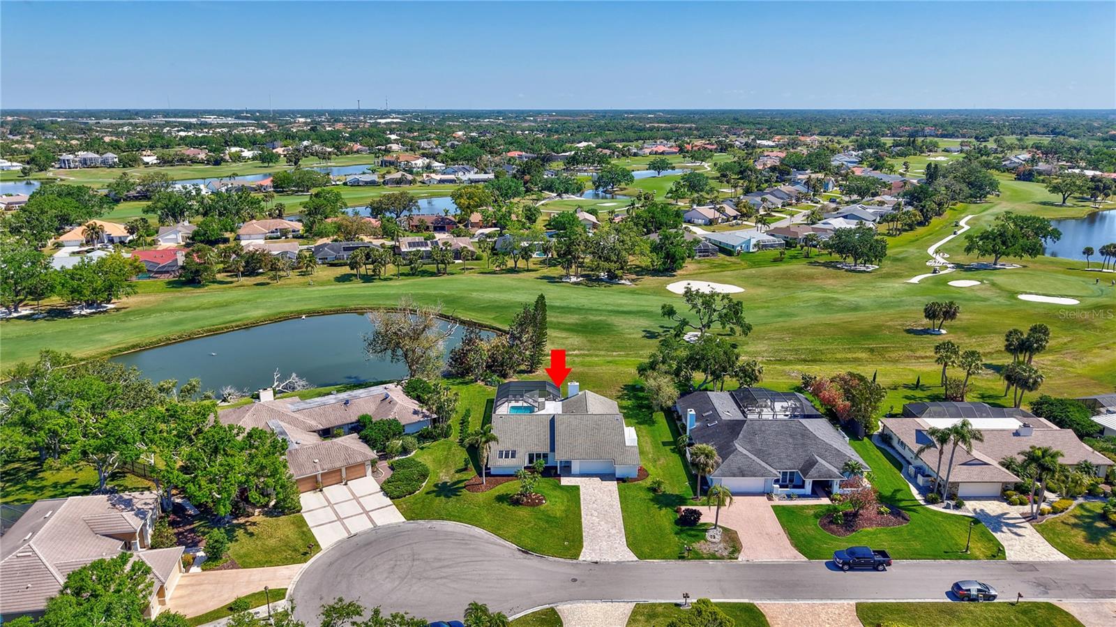 FULLY FURNISHED and MOVE-IN READY. Welcome home to the best of Sarasota. This updated home is located in Country Club of Sarasota in the heart of Palmer Ranch. Sitting on a spacious lot, this property allows golf course and lake views while strategically placed to offer a quiet and serene setting. Drenched in natural light, this 3-bedroom split plan home has been beautifully updated to enhance the vaulted ceilings, walls of sliding glass doors, and an open and inviting floorplan. Luxury vinyl wide plank flooring flows throughout allowing a smooth transition between rooms. Impact windows and sliders open to the expanded outdoor areas. The enlarged pool deck, panoramic pool cage and pavered outdoor sitting area with firepit are easily accessed to seamlessly merge inside with outside areas. The living/dining room is open and inviting. The kitchen is the hub of the home and connects the living/dining and family rooms. The updated and FULLY STOCKED kitchen opens to the family room with wood burning fireplace and views of the golf course. Quartz countertops, Kraftmaid cabinets and new appliances make the kitchen perfect for entertaining. The Primary Bedroom is had sliders opening to the pool, vaulted ceiling, and a large walking closet with built in shelving. The en-suite bathroom has his/her sink areas, a beautiful walk-shower, heated towel rack, and a private 12’x6’ outdoor lounging patio. There are two additional bedrooms with a fully updated bath. One bedroom had sliders opening to the outdoor seating area, while the 3rd bedroom has a private patio area perfect for sunning. The pool area contains the 3rd full bath with shower. The upgrades are numerous including: interior and exterior painting, new pool heater, tumbled marble pool deck, impact garage door, electrical panel, new light fixtures. Join Prestancia and take your golf cart down the street and across the bridge to the golf courses. Country Club of Sarasota is close to Legacy Trail, Siesta Key beaches, Shopping/Entertainment, and all Sarasota has to offer. Don’t miss this amazing property!
