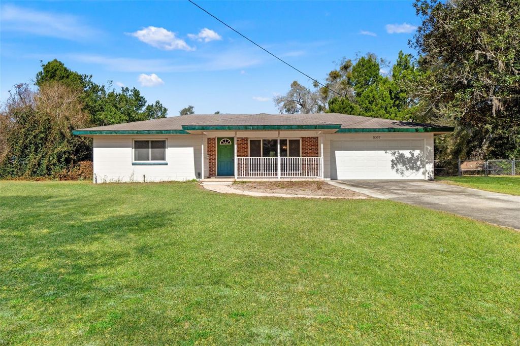 Photo of 5067 Mockingbird Drive, Dade City, FL 33523 (MLS # W7883438)