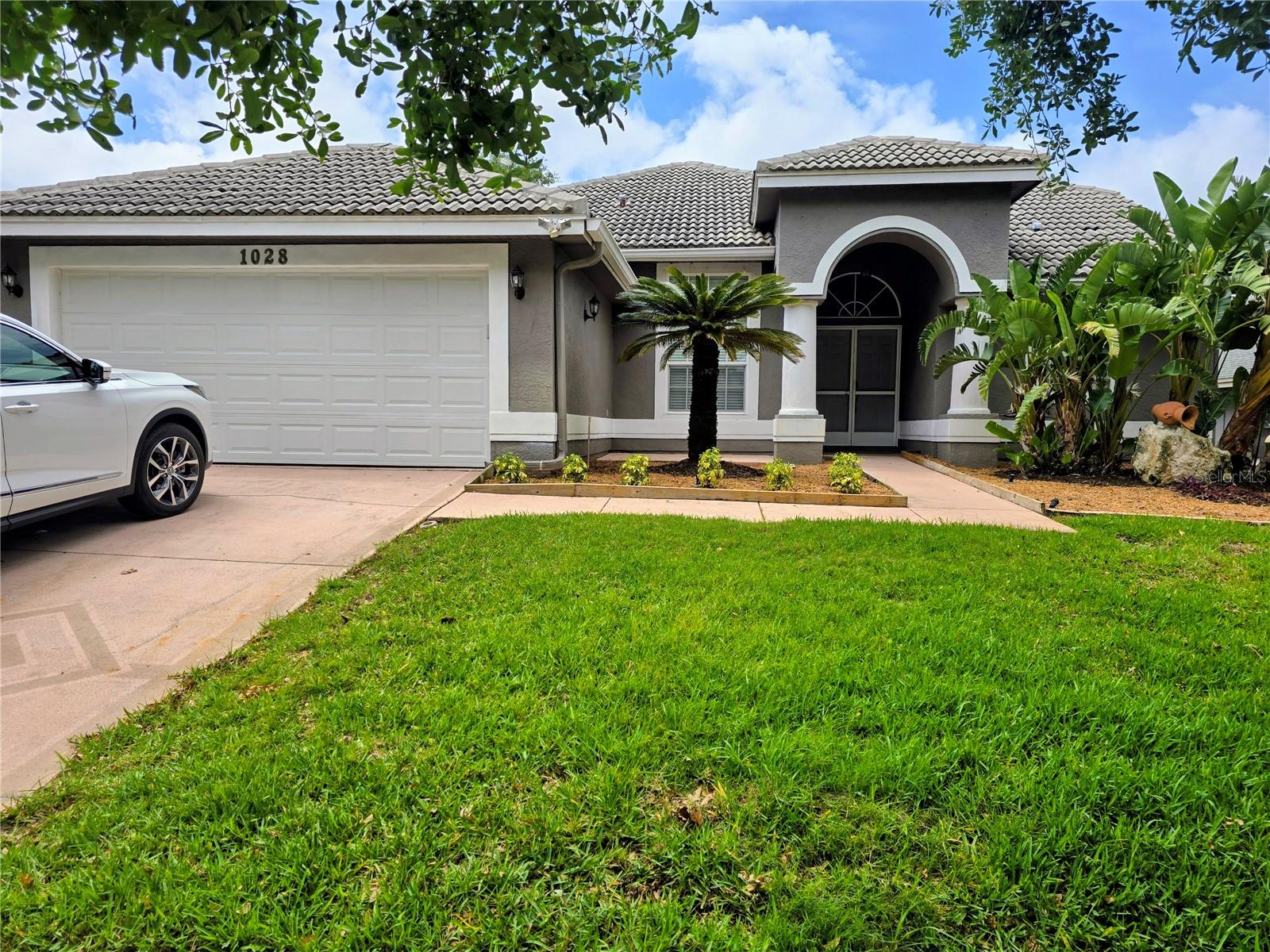 Welcome to this beautifully maintained and tastefully furnished 3-bedroom, 2-bathroom pool home in the sought-after Westwinds community of Tarpon Springs. Offering a 2-car garage and split-bedroom floor plan, this home blends comfort, style, and the best of Florida living. The spacious living area features cathedral ceilings and sliding glass doors that open to a serene patio and private pool—perfect for relaxing or entertaining. Durable laminate flooring flows throughout the main living areas and bedrooms, with tile in the kitchen and baths.
The private primary suite includes a walk-in closet, cathedral ceiling, pool access, and a luxurious ensuite with a multi-head shower, hydro-massage tub, and dual vanities. The kitchen boasts custom solid wood cabinetry, granite countertops, stainless steel appliances, and a stylish tile backsplash, complemented by both a formal dining room and cozy eat-in nook.
Located just outside Palm Harbor, you're minutes from the Pinellas Trail, Gulf beaches, shopping, dining, and more. Don’t miss this opportunity to own a stunning home in one of Tarpon Springs' most desirable neighborhoods!