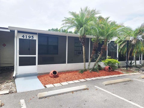 Photo of 4195 E Michigan Street #4195, Orlando, FL 32812 (MLS # TB8513021)