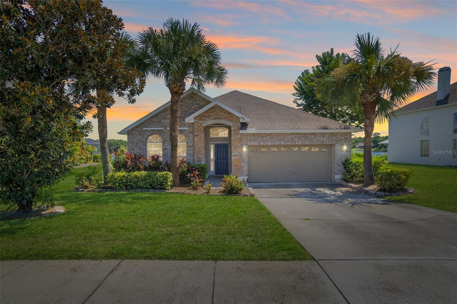 Your Lakefront Oasis Awaits....Welcome to this beautifully maintained 4-bedroom, 2-bathroom home located in the highly sought-after gated community of Willows on the Lake in Ocoee, FL. Set on a peaceful lakefront lot, this residence combines elegance, comfort, and stunning water views. Step inside to discover a freshly painted interior with updated finishes and a spacious, well-designed floor plan. The home features both a separate formal living and dining area, perfect for hosting gatherings or creating versatile spaces to fit your lifestyle. The expansive owner’s suite offers a private retreat with a spa-like ensuite bathroom, complete with a soaking tub, walk-in shower, and dual vanities. Additional bedrooms are generously sized, ideal for family or guests. Enjoy the beauty of Florida living from your screened-in lanai and backyard, where tranquil lake views create a peaceful oasis for morning coffee or evening sunsets. This home is ideal for those who appreciate nature and outdoor living. Located in a secure, gated community, Willows on the Lake offers a private and welcoming atmosphere while still being minutes from shopping, dining, major highways, and top-rated schools. This home will not last schedule your private showing today!