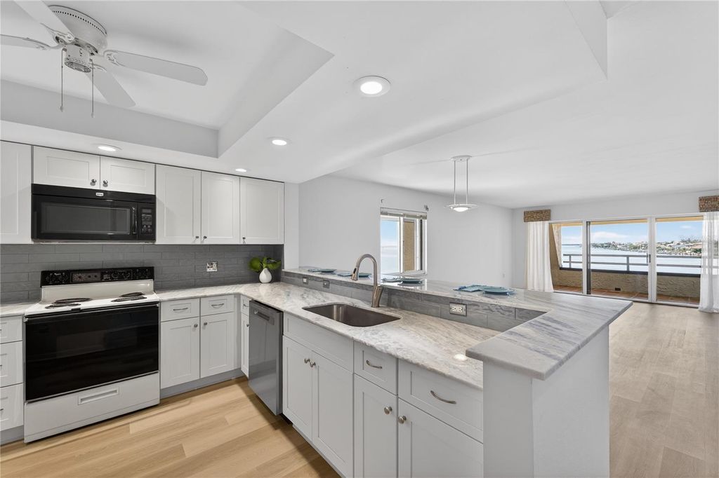 Photo of 138 1st Street E #302, St Petersburg, FL 33715 (MLS # U8249724)